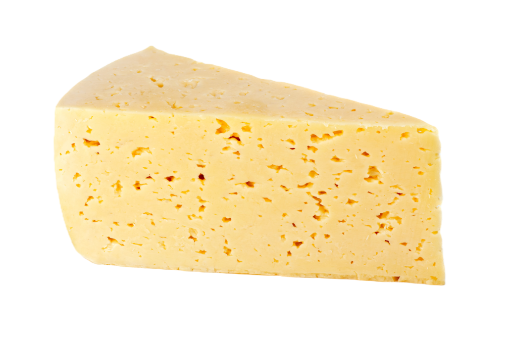 Queso presentado en su forma característica, con una textura y corte visibles.